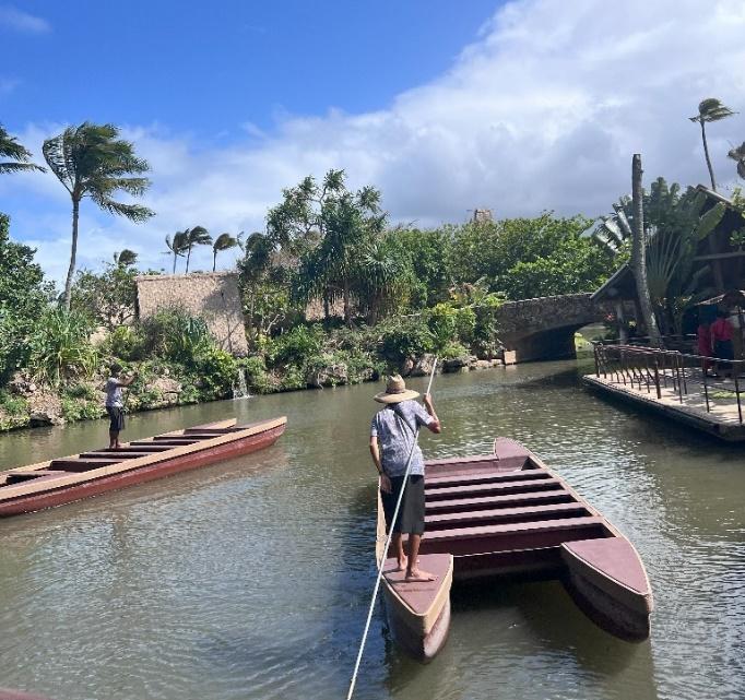 A person on a boat in a river

Description automatically generated