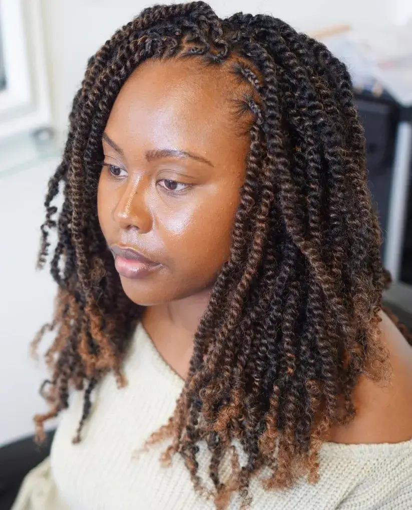 Picture of a lady wearing the Kinky Twist Hairstyle