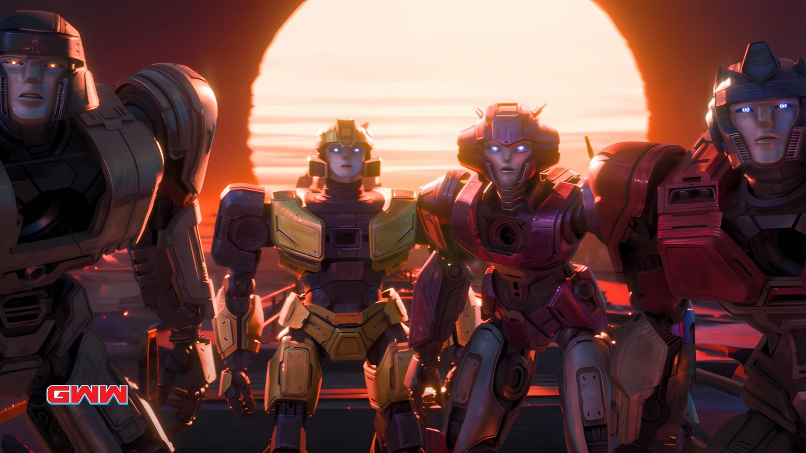 Orion Pax, Elita, D-16, and B-127 standing against a sunset background.