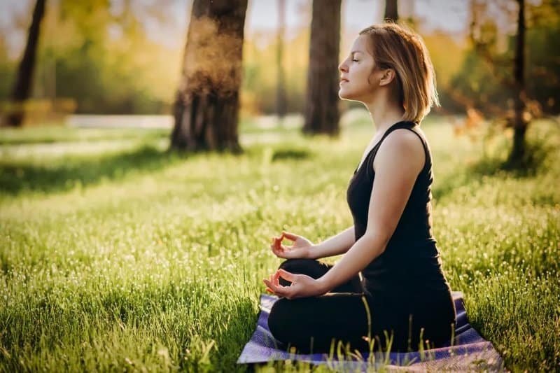 woman doing a pranayama technique