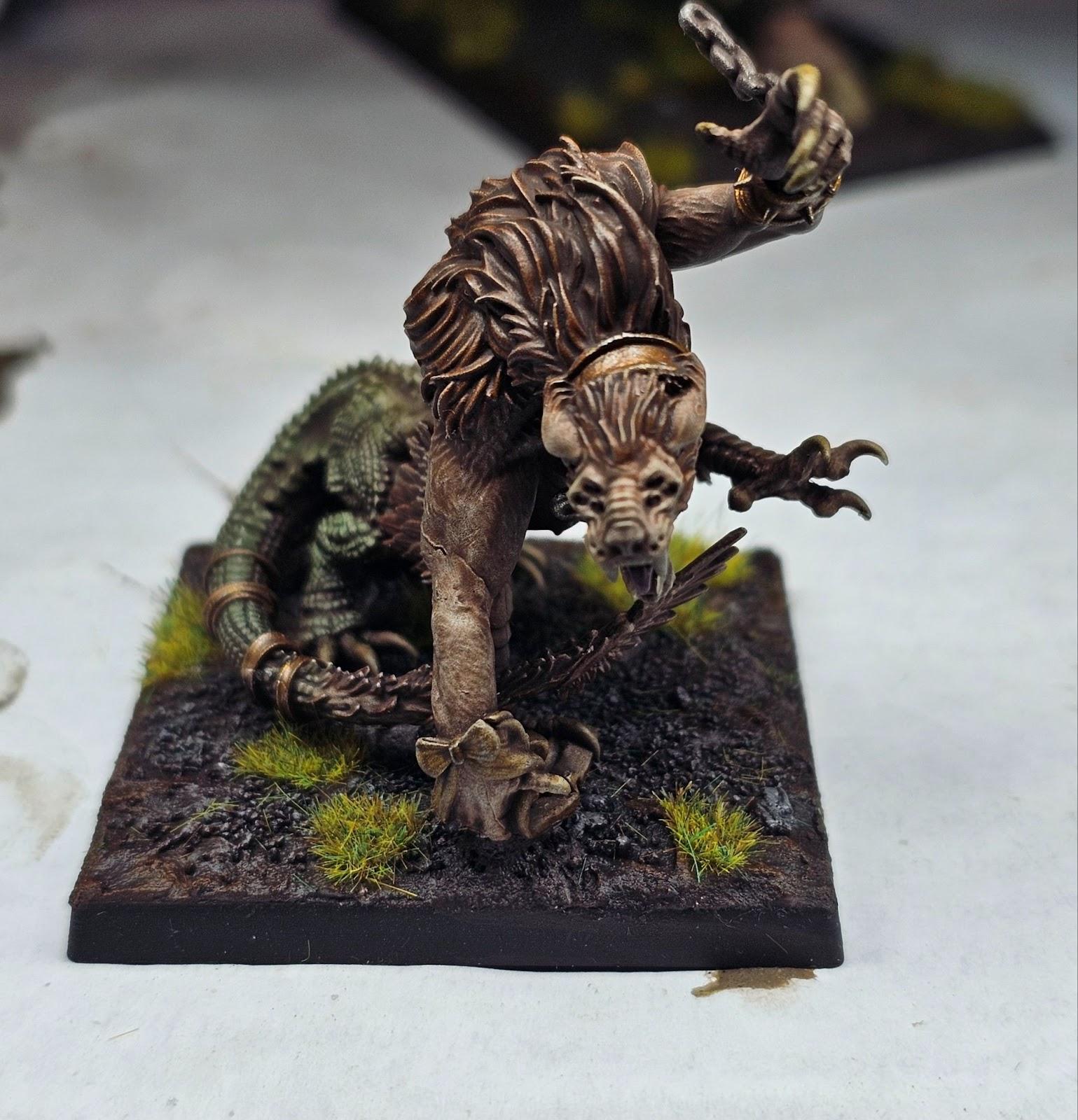 A statue of a monster  Description automatically generated