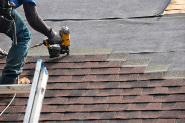 top ways to weatherproof your michigan home remodeler installing roof tiles custom built okemos