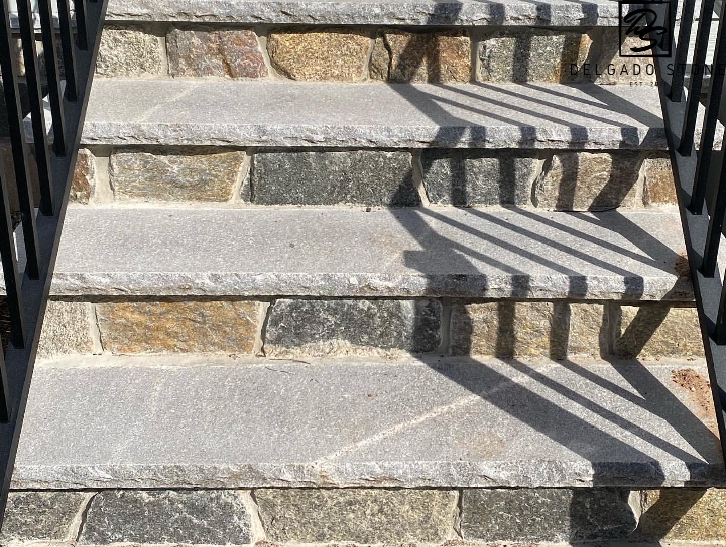 natural stone steps with natural stone veneer risers