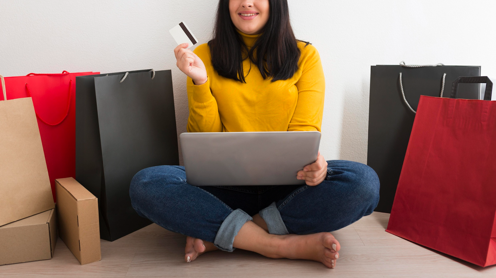 woman smiling while doing online shopping