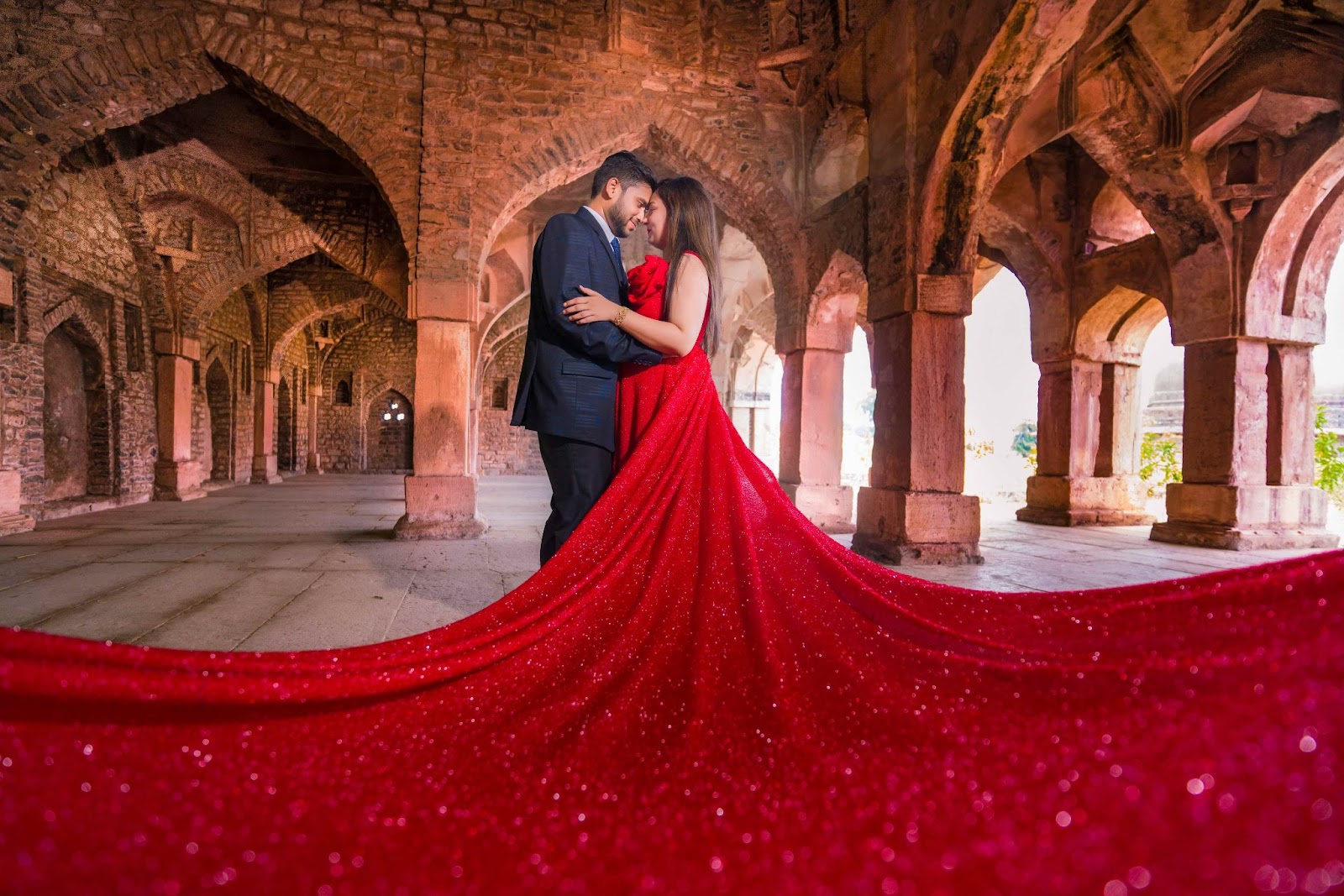 Pre-wedding shoot location in Mandu, near Indore, capturing a touching moment as the couple gently touch foreheads. Captured by Harsh Studio Photography, a premier wedding photographer in Indore, recognized for their exceptional services. Keywords targeted: Wedding photographer, Best wedding photographers, Wedding photography services, Professional wedding photographers, Wedding photographer near me, Affordable wedding photographers Indore, Top-rated wedding photographers, Wedding photographer availability Indore, Wedding photographer portfolio Indore, Wedding photographer rates in Indore. Harsh Studio Photography excels in capturing intimate pre-wedding moments, showcasing their expertise and dedication.