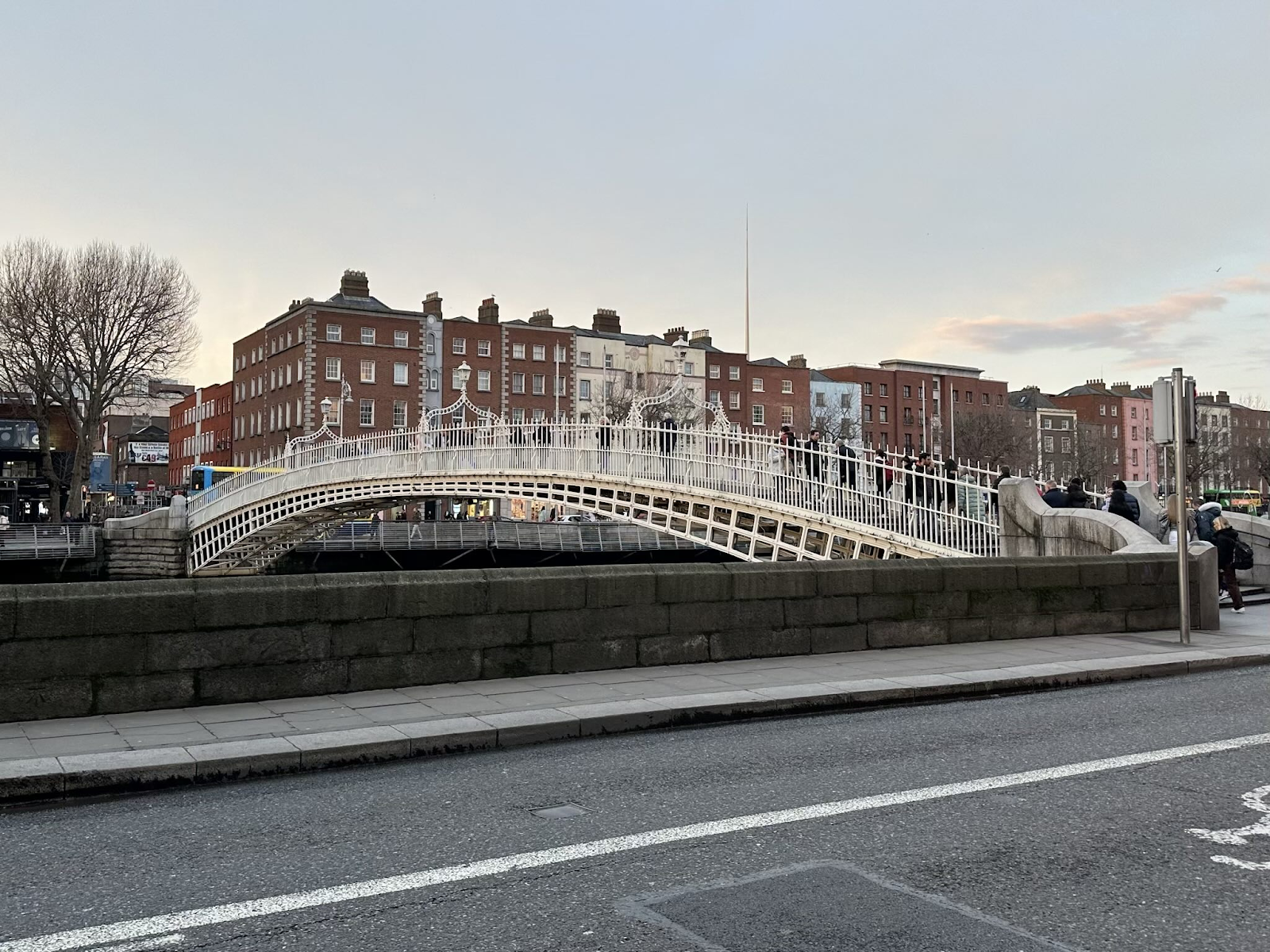 A bridge in Ireland with buildings around.