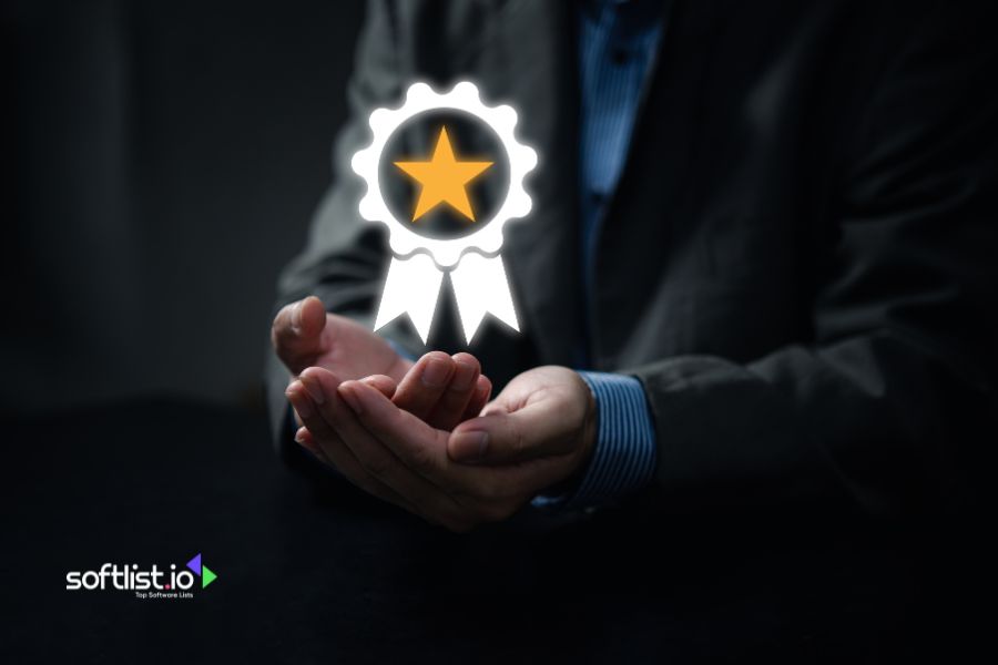 Business professional holding a virtual award icon with star.