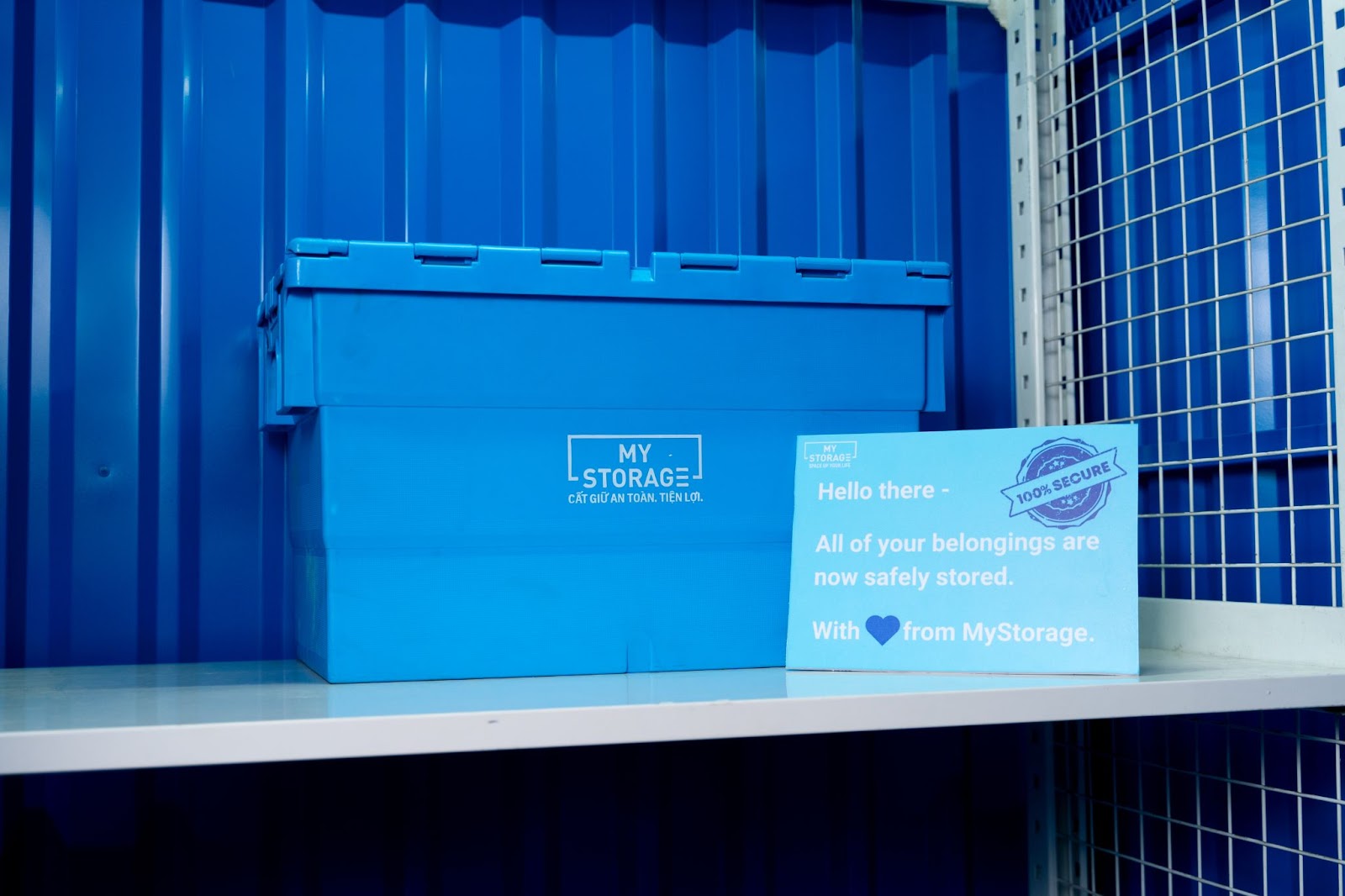 MyStorage blue boxes on the shelf in a storage unit