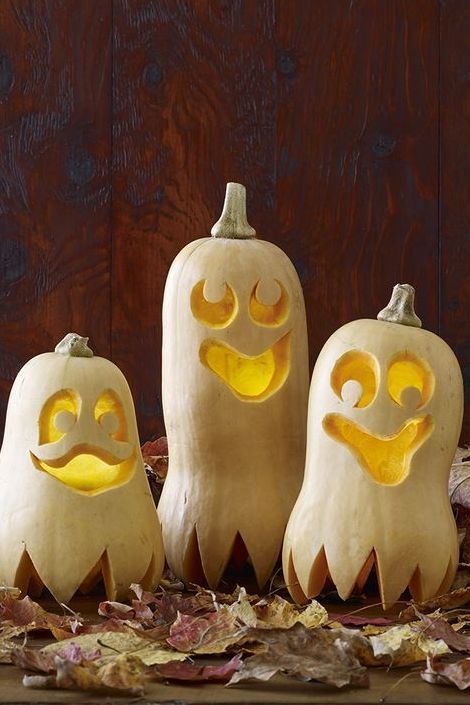 pumpkin carving ideas, three white carved ghost pumpkins