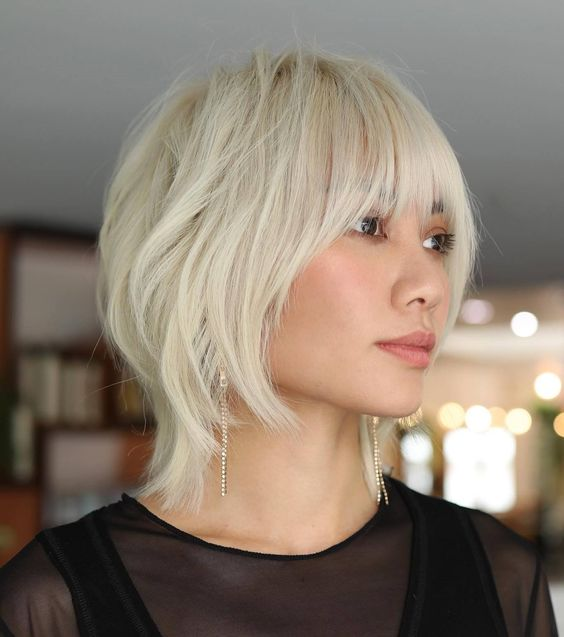 Picture of a lady wearing the Short Layered Haircuts for Straight Hair
