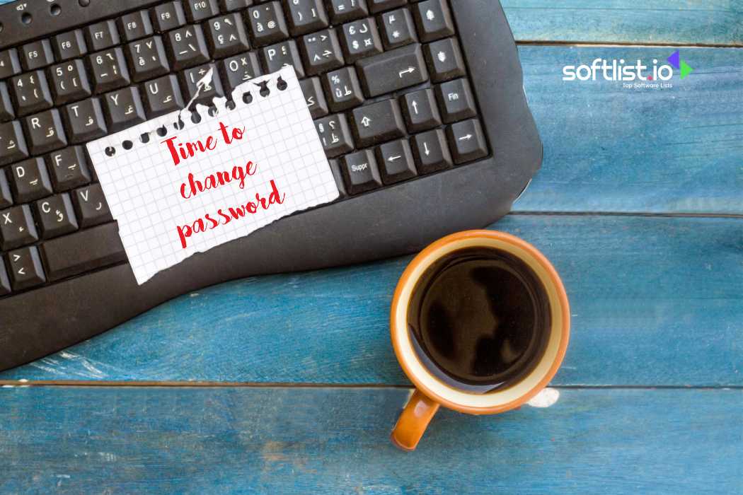 Keyboard with note saying 'Time to change password' and a cup of coffee