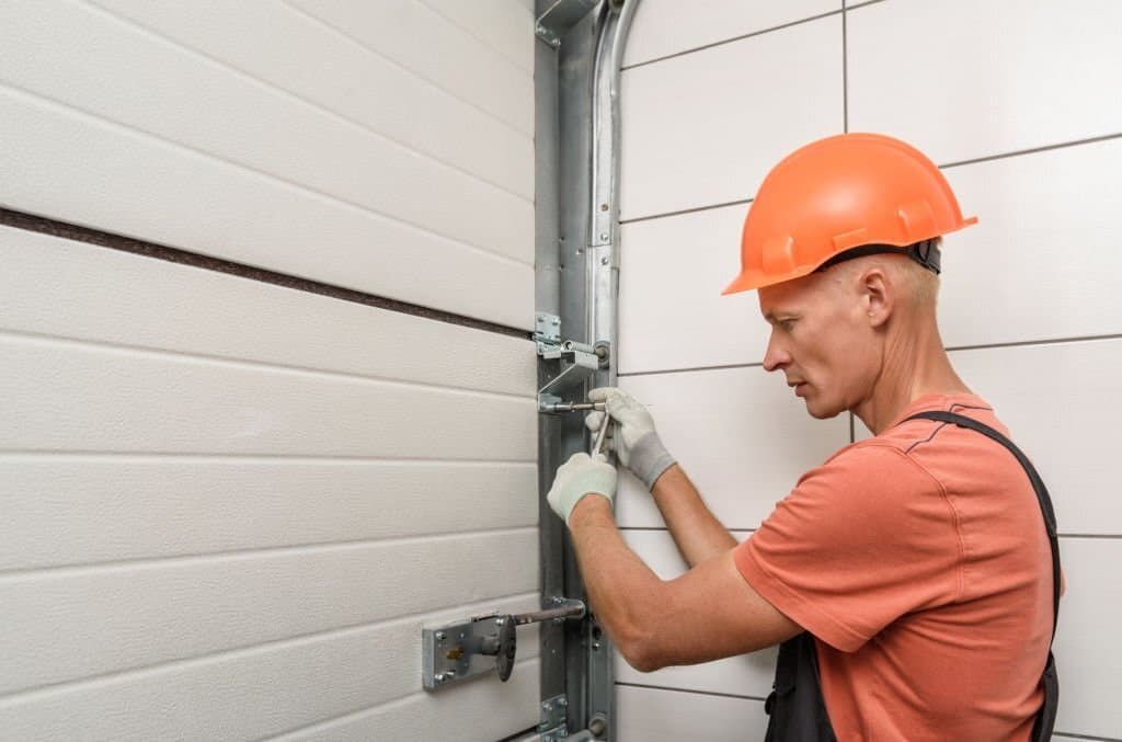 how to replace garage door rollers