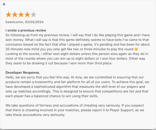 A 4-star Apple App Store review from a Blockolot user who likes playing and has won money but fears they may be playing against bots. The developer responded asking them to contact support.  