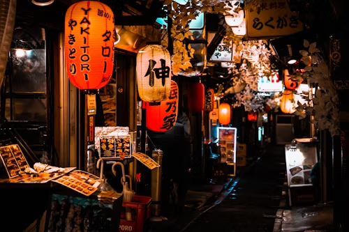 Street View of Omoide Yokocho filled with cultural lighting during the nighttime