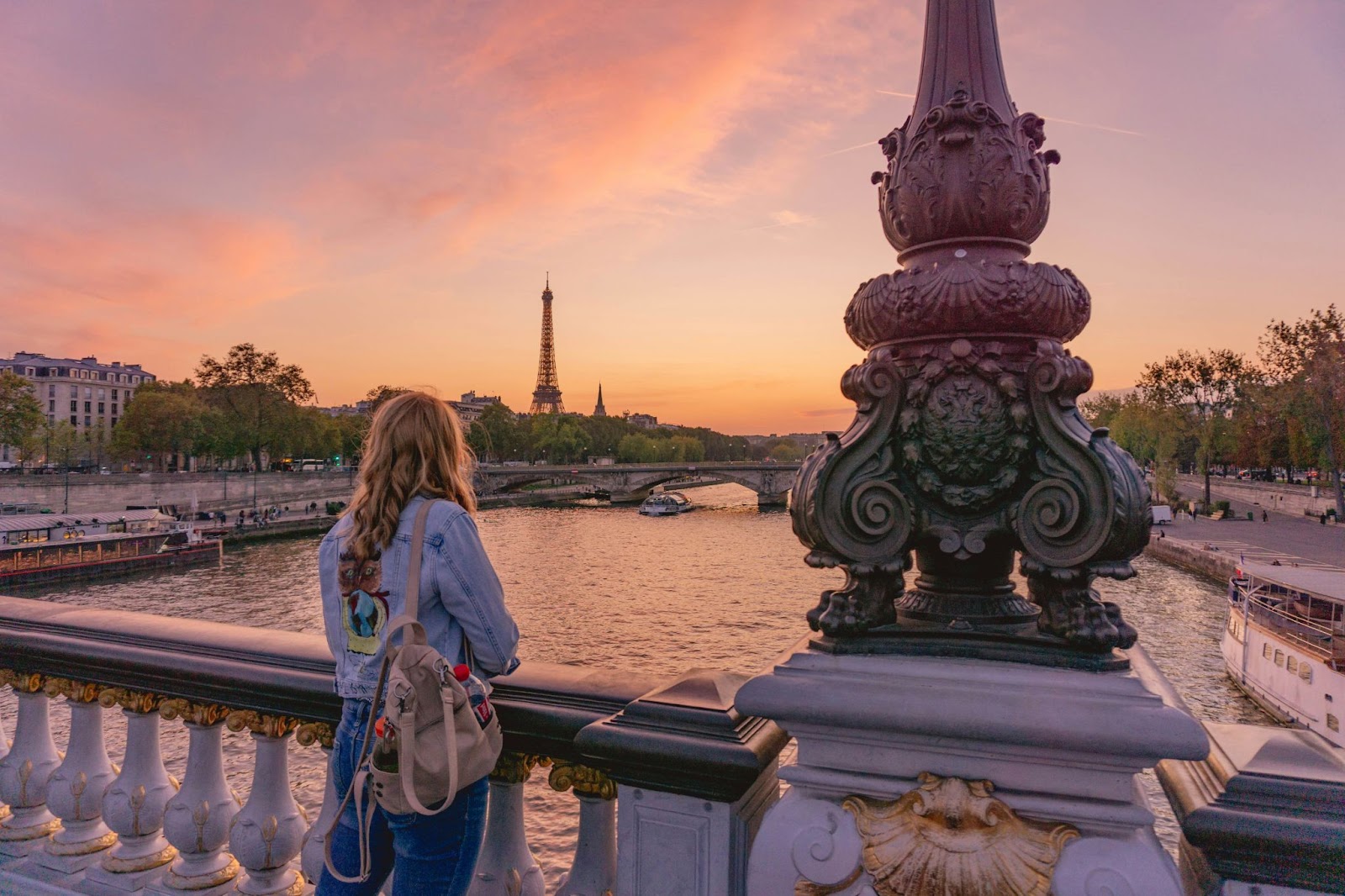 A woman exploring Paris with a guide