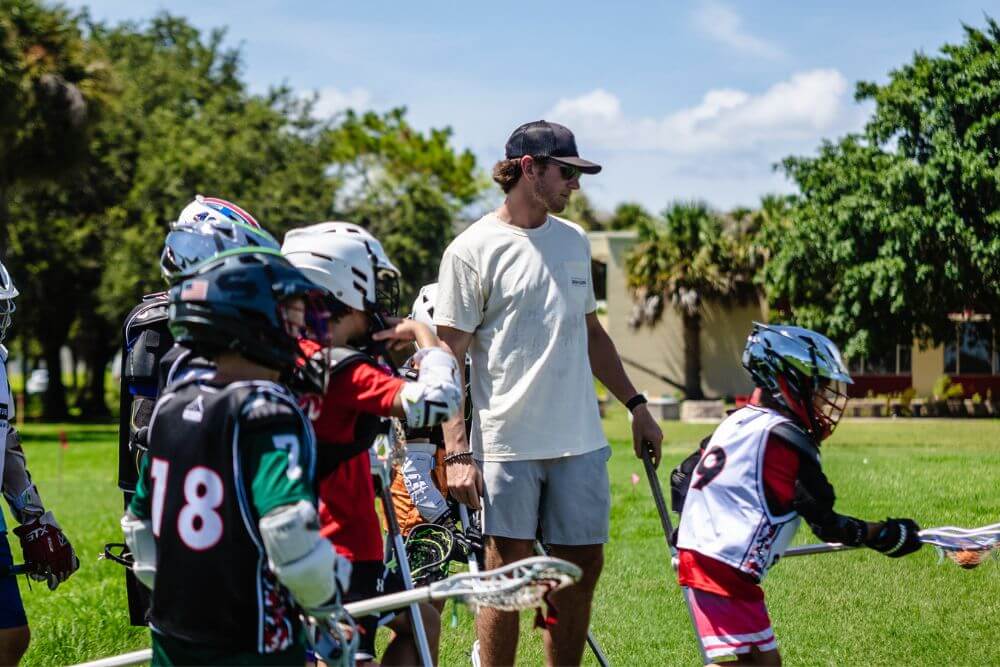 professional lacrosse player Andrew Kew during a lacrosse practice session at overnight sports camp