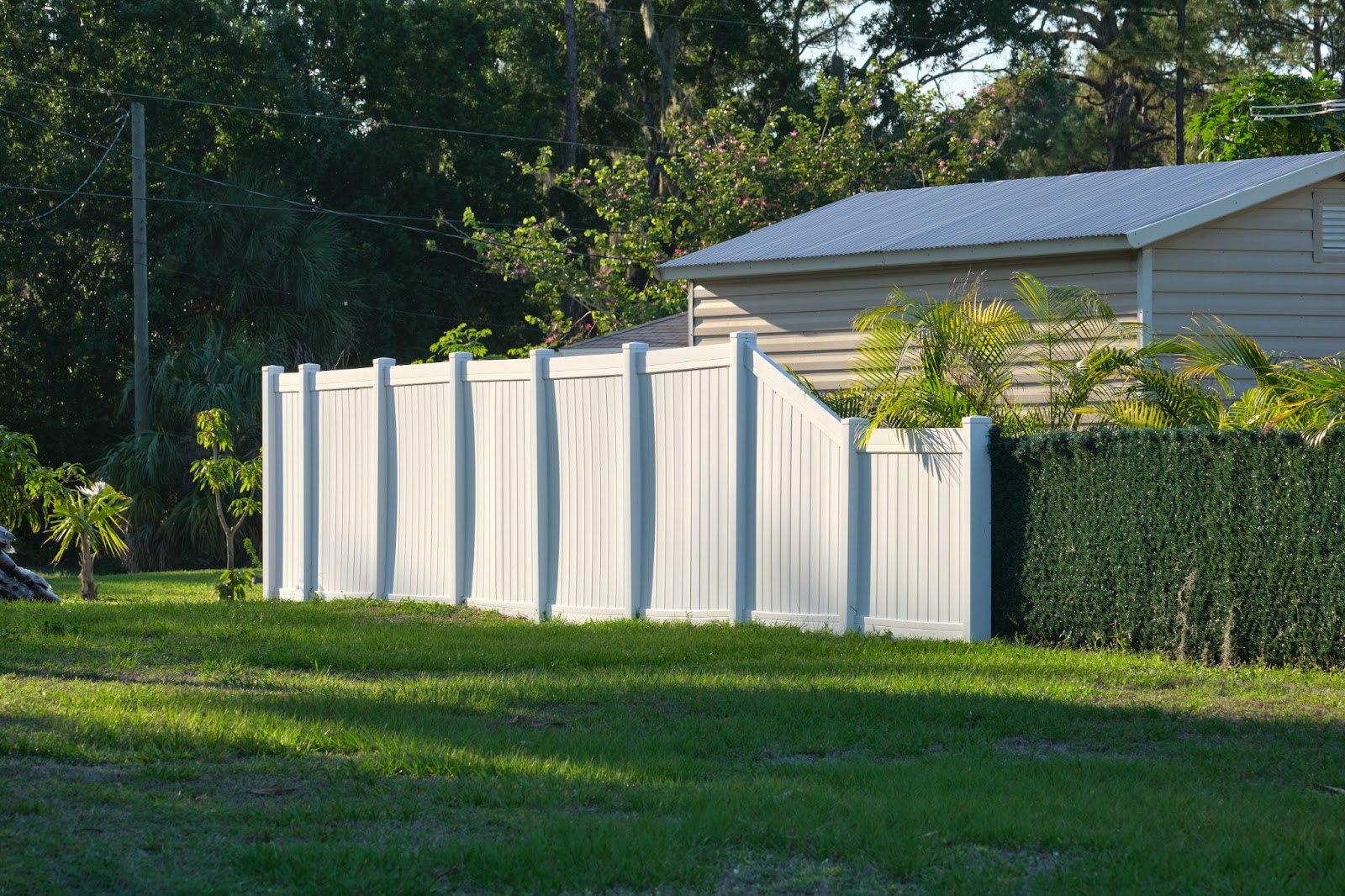 Vinyl fence next to a home. 