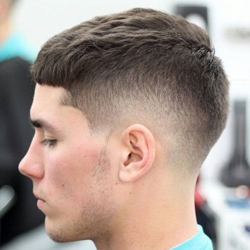 Side view of a man wearing the iconic low taper