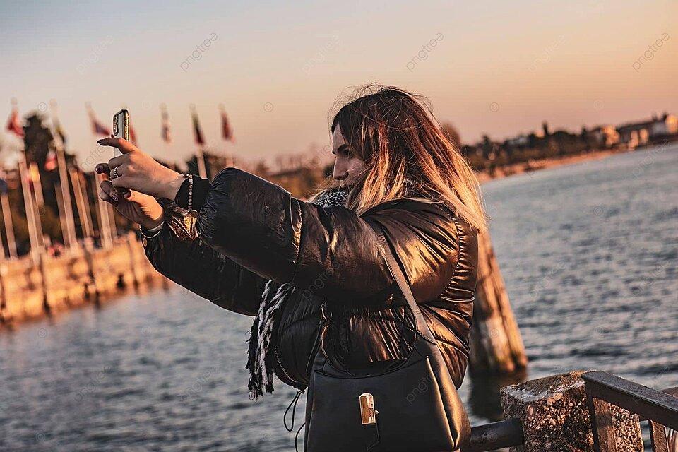 Contented Girl Captures Serene Sunset View From Pier In A Selfie Photo  Background And Picture For Free Download - Pngtree