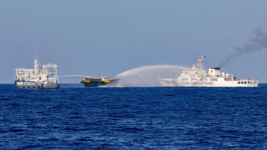 Chinese Coast Guard vessels fire water cannons towards a Philippine resupply vessel Unaizah May 4 on its way to a resupply mission at Second Thomas Shoal in the South China Sea, March 5, 2024.