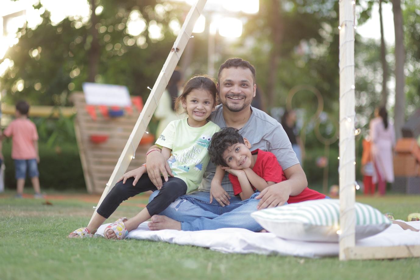 Children having fun with parents at Palava Kids Fest at Lakeshore Club Lawn in Palava City