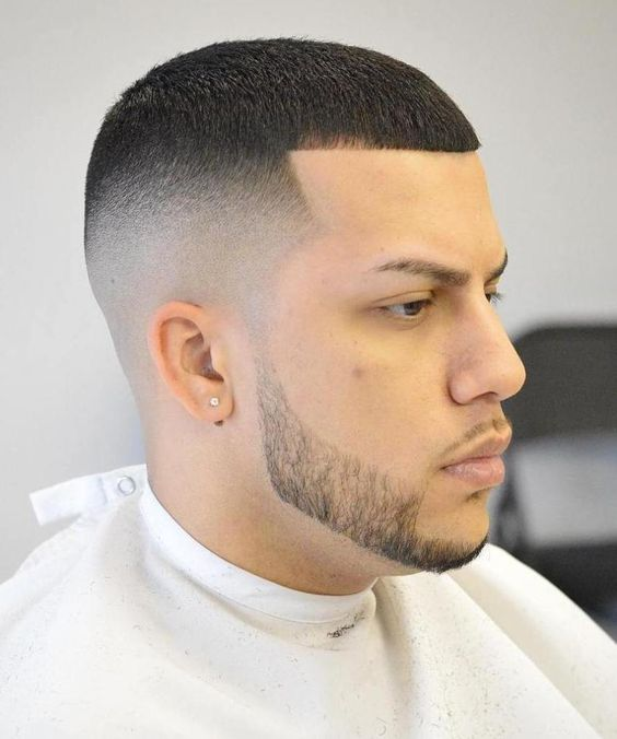 Side view of a guy wearing the  Line-Up Buzz Cut Fade