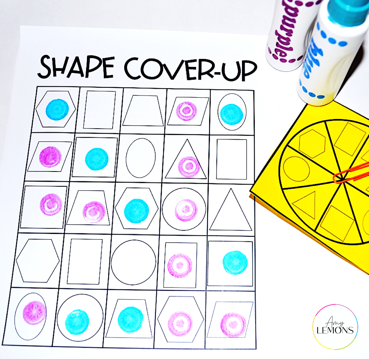 Shape BINGO activity using paint dot markers.