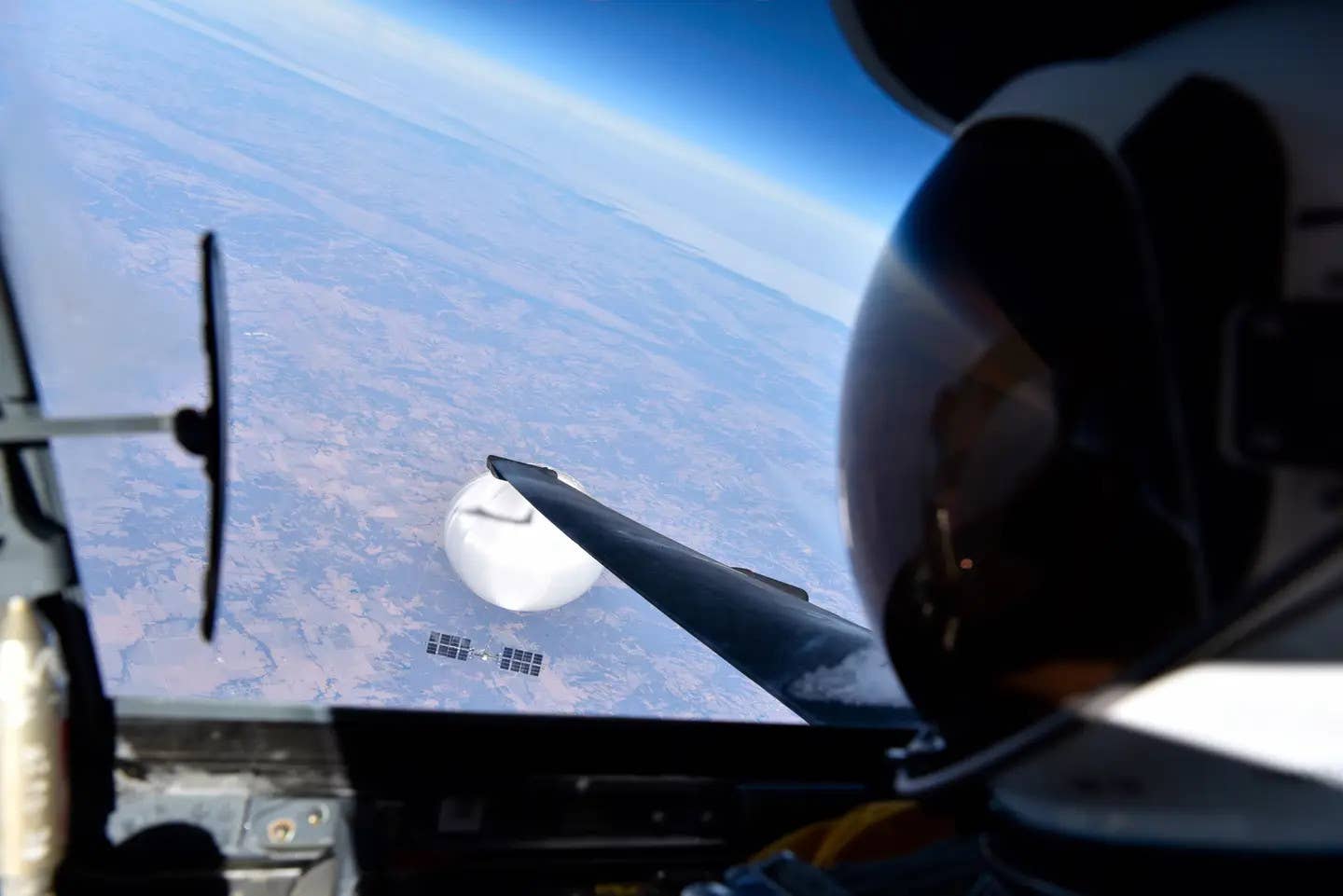 A picture of a Chinese spy balloon soaring over the United States in February 2023 taken from the cockpit of a U-2 spy plane. <em>DOD</em>