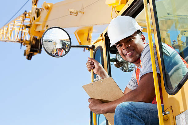Seamless Gutters and Heavy Lifting: The Essential Role of Crane Operators in Construction