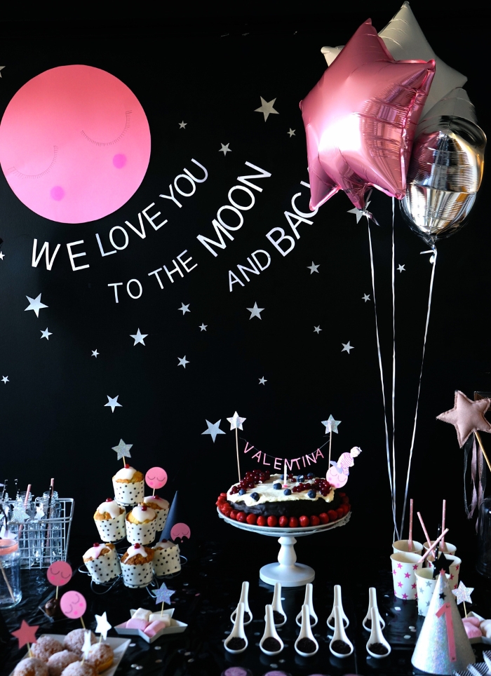 love you to the moon and back food table with black background