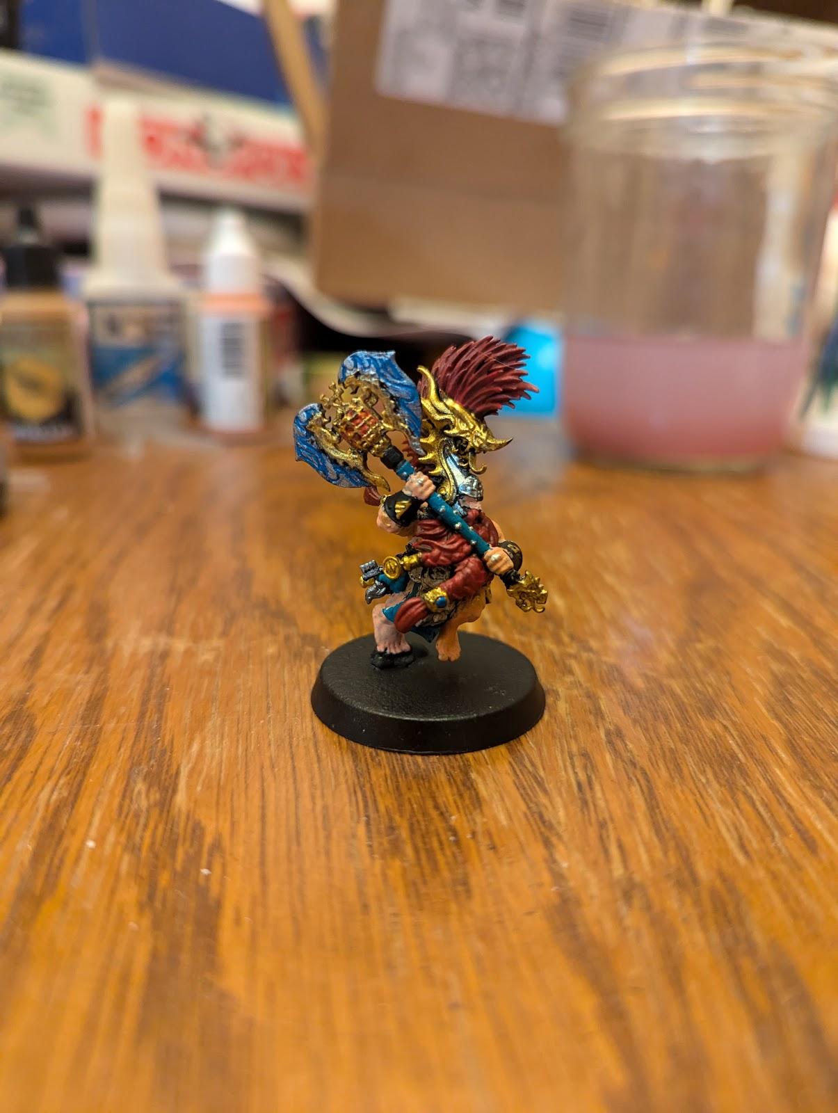 A toy figurine on a table  Description automatically generated