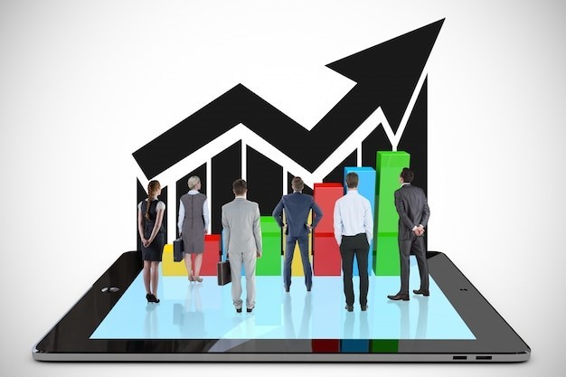 People over a tablet with a bar graph