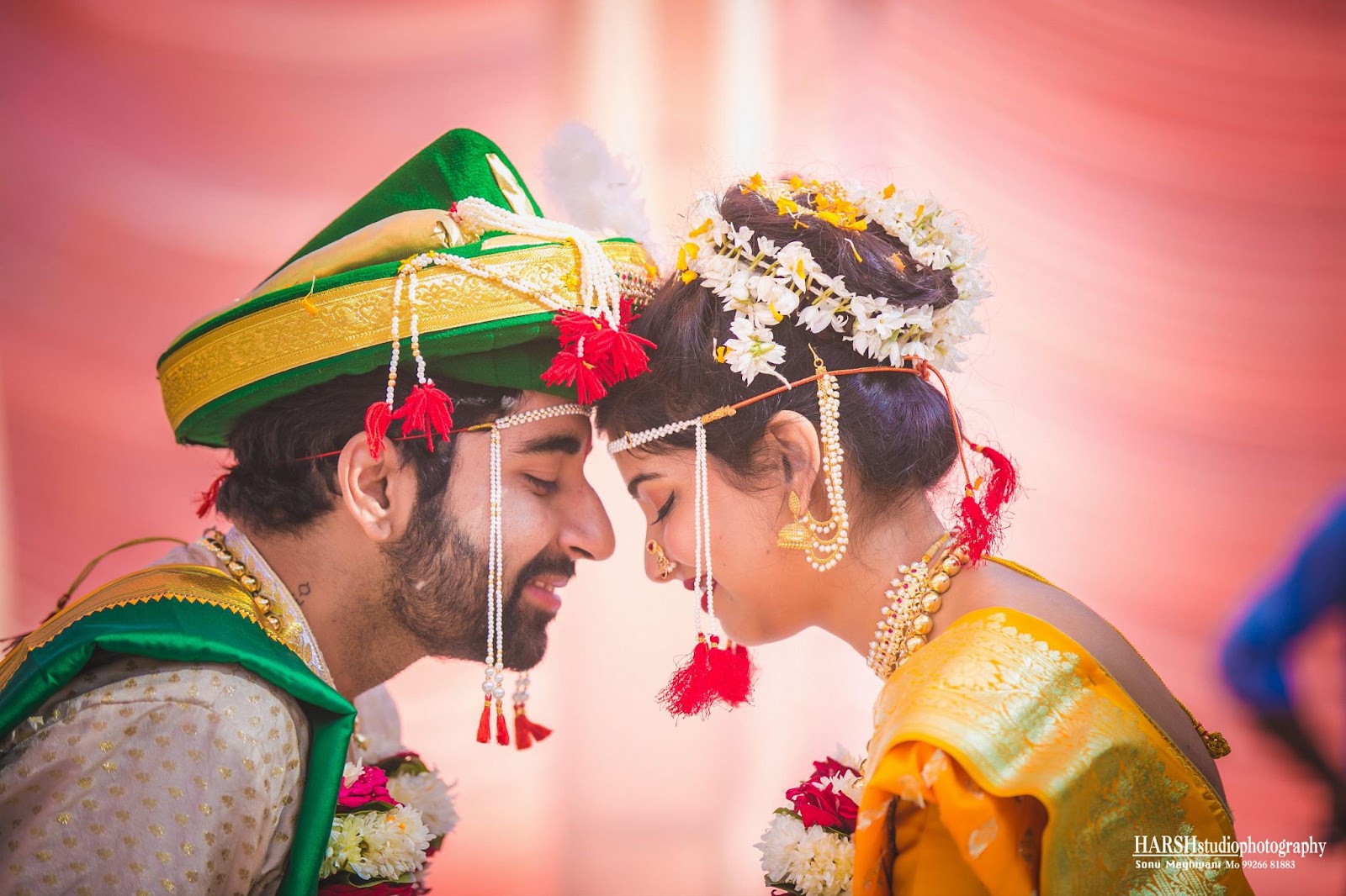 A couple at a Marathi wedding in Indore, sharing a moment as they see each other. Captured by Harsh Studio Photography in 2024, known for their skill in capturing authentic and emotional wedding moments