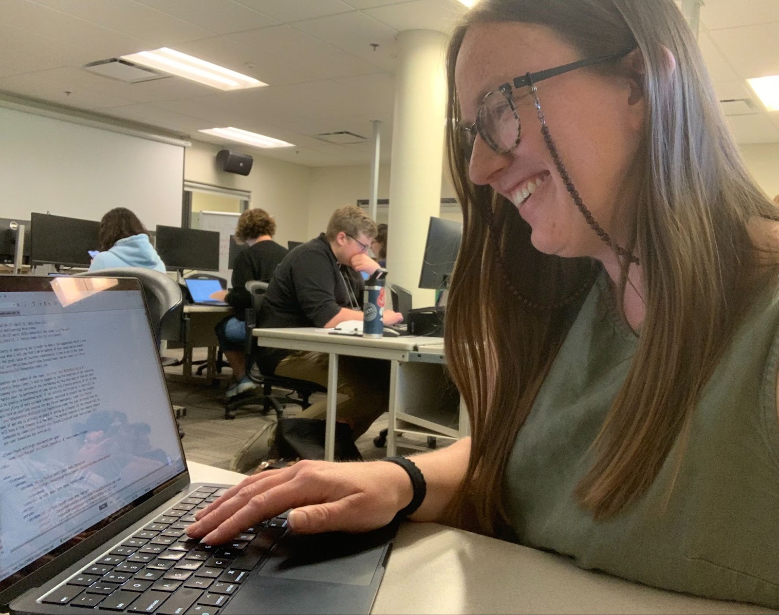 Peterson learning to encode the Fant letter with TEI at the 2024 Digital Humanities Summer Institute