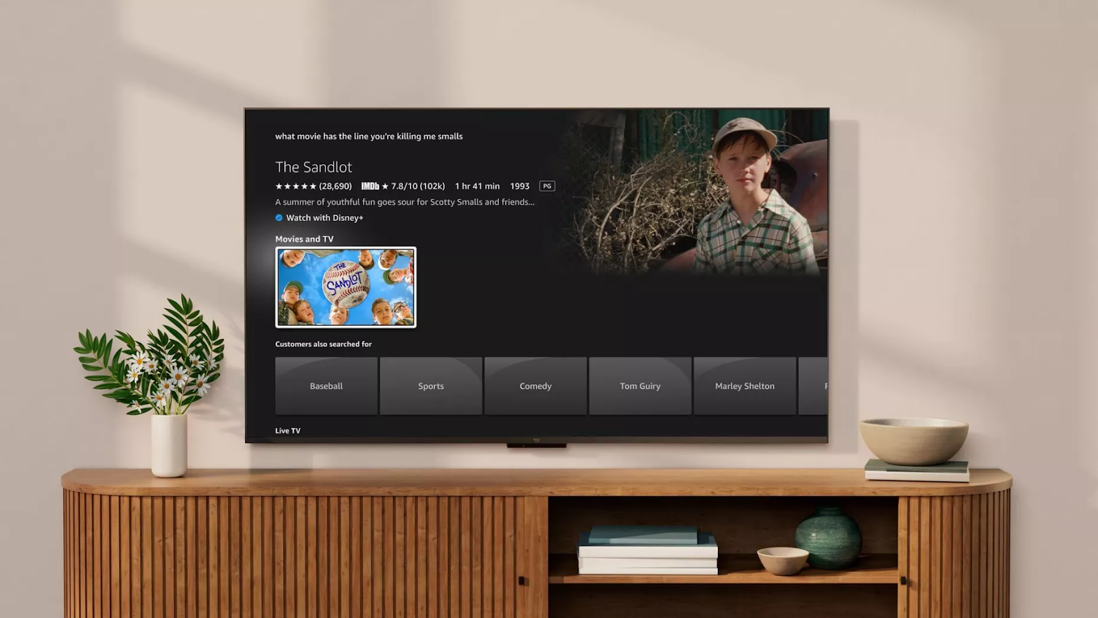 Amazon Fire TV displaying the movie "The Sandlot" in response to the search query, "What movie has the line, 'You're killing me Smalls?'"