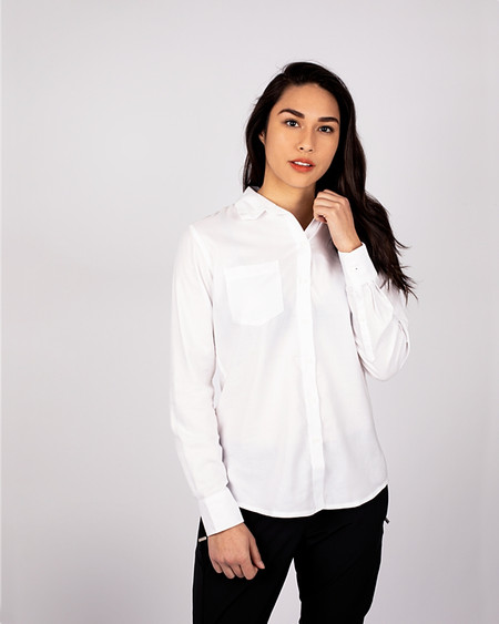 Woman wearing a white Cutter & Buck Womens Windward Twill Long Sleeve Shirt