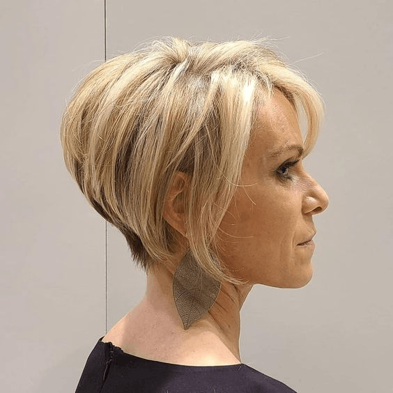 Short hairstyles: Side view of a lady wearing the gorgeous hairdo