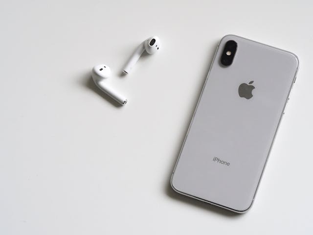 An image of iPhone and a Headset