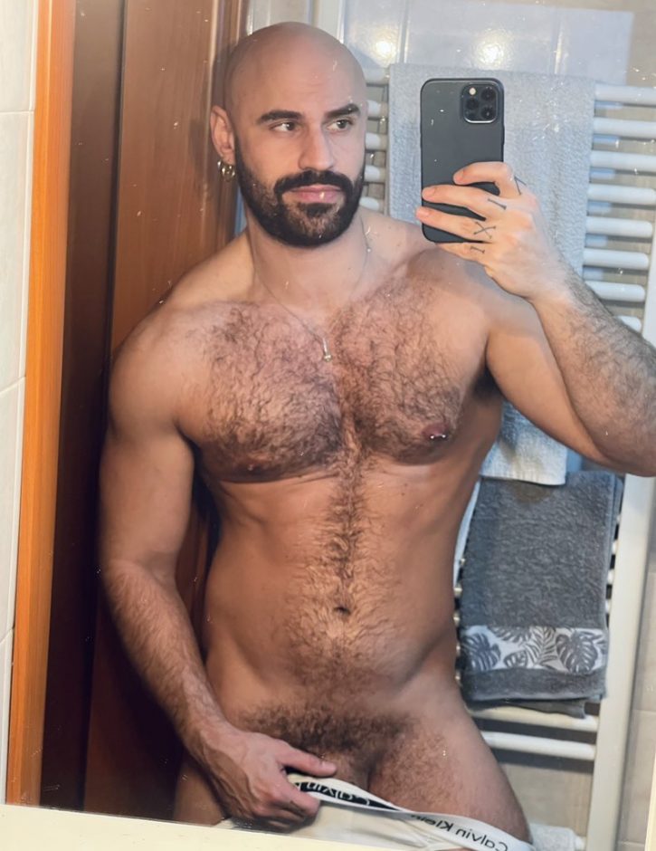 Mister Caccamo with his calvin klein underwear pulled down to reveal the shaft of his flaccid cock and his gay hairy muscle daddy chest