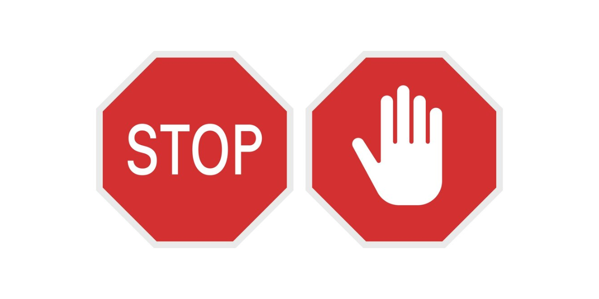 Two stop signs symbolizing the limitations of no-sign-up QR code generators and when they may no longer meet your needs.