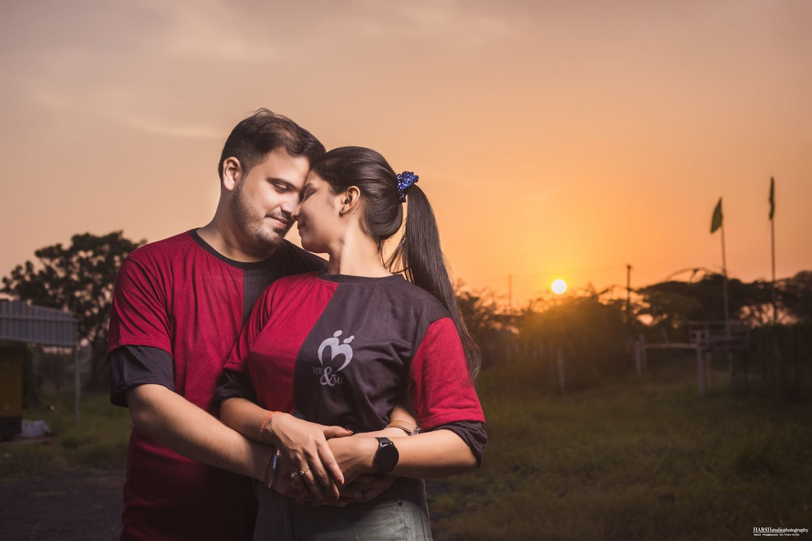 Romantic moment as couple gazes at each other during sunset in Indore. Captured by Harsh Studio Photography, a leading wedding photographer in Indore, known for their exceptional team and expertise. Located in Indore, Madhya Pradesh, India.