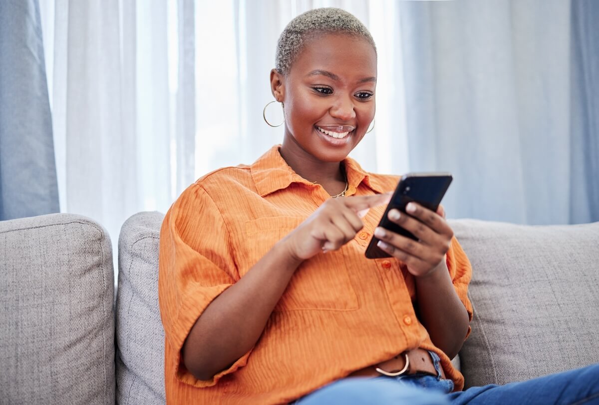 Patient communication platform: woman using her phone