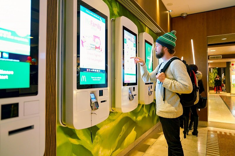 Interactive kiosk for user experience - How Does UI/UX Design Transform User Experience in Physical Spaces - image 2