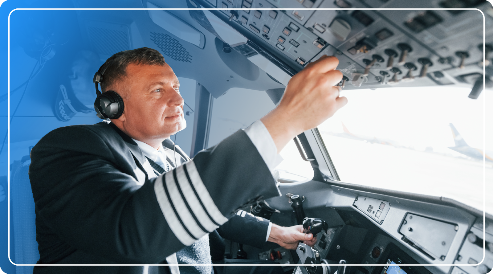 An airline captain in the flight deck.