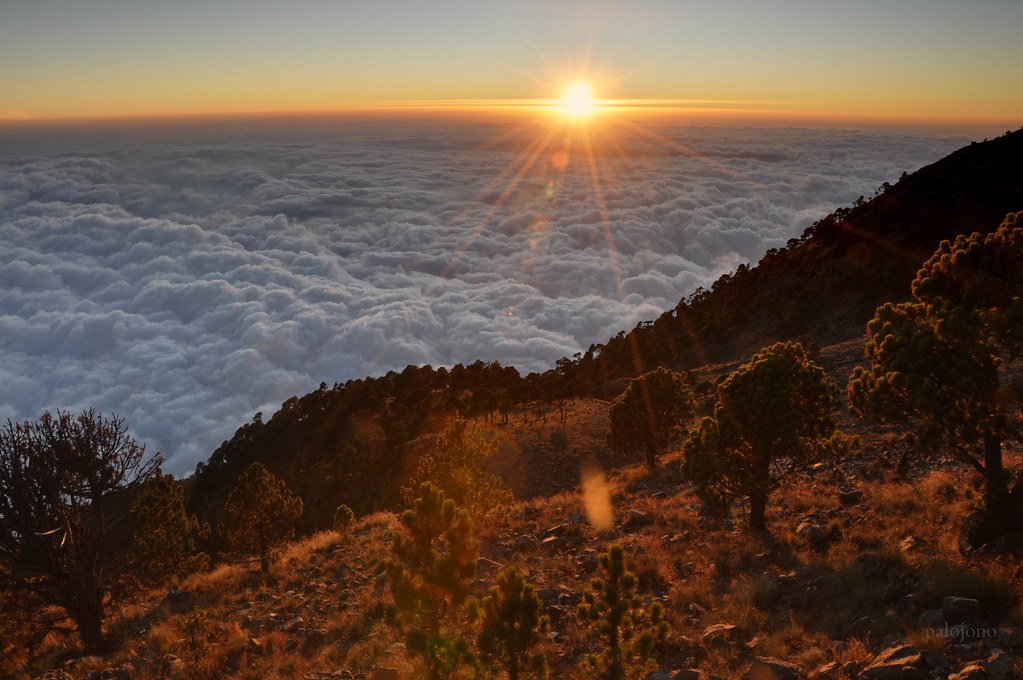 A breathtaking sunset with a gorgeous sky and horizon above the Tajumulco Volcano in Guatemala.