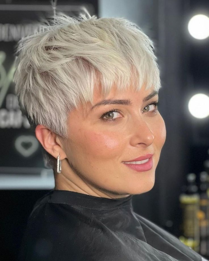 Picture of a lady wearing the gorgeous  blond  pixie