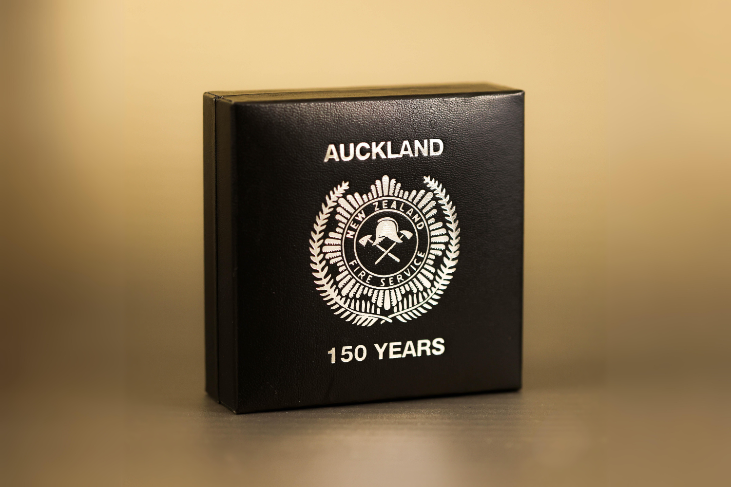 Vegan leather box customised with Auckland New Zealand Fire Service logo..