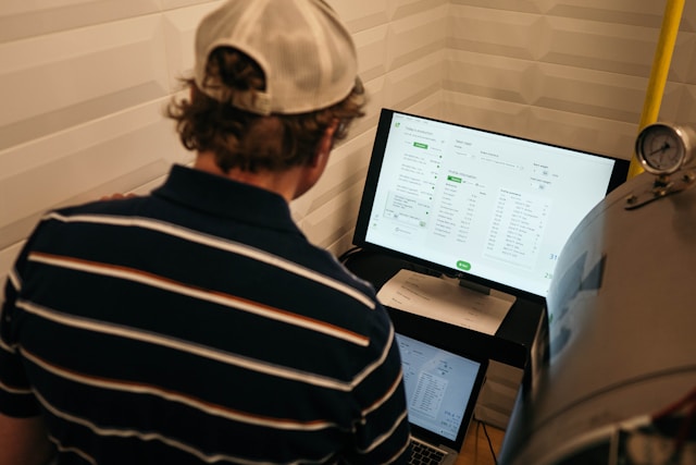 An employee working on his desktop.