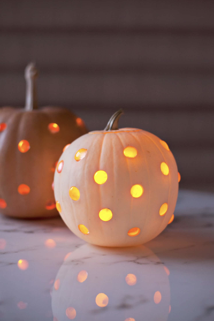 pumpkin carving ideas, small pumpkin with glowing glass beads