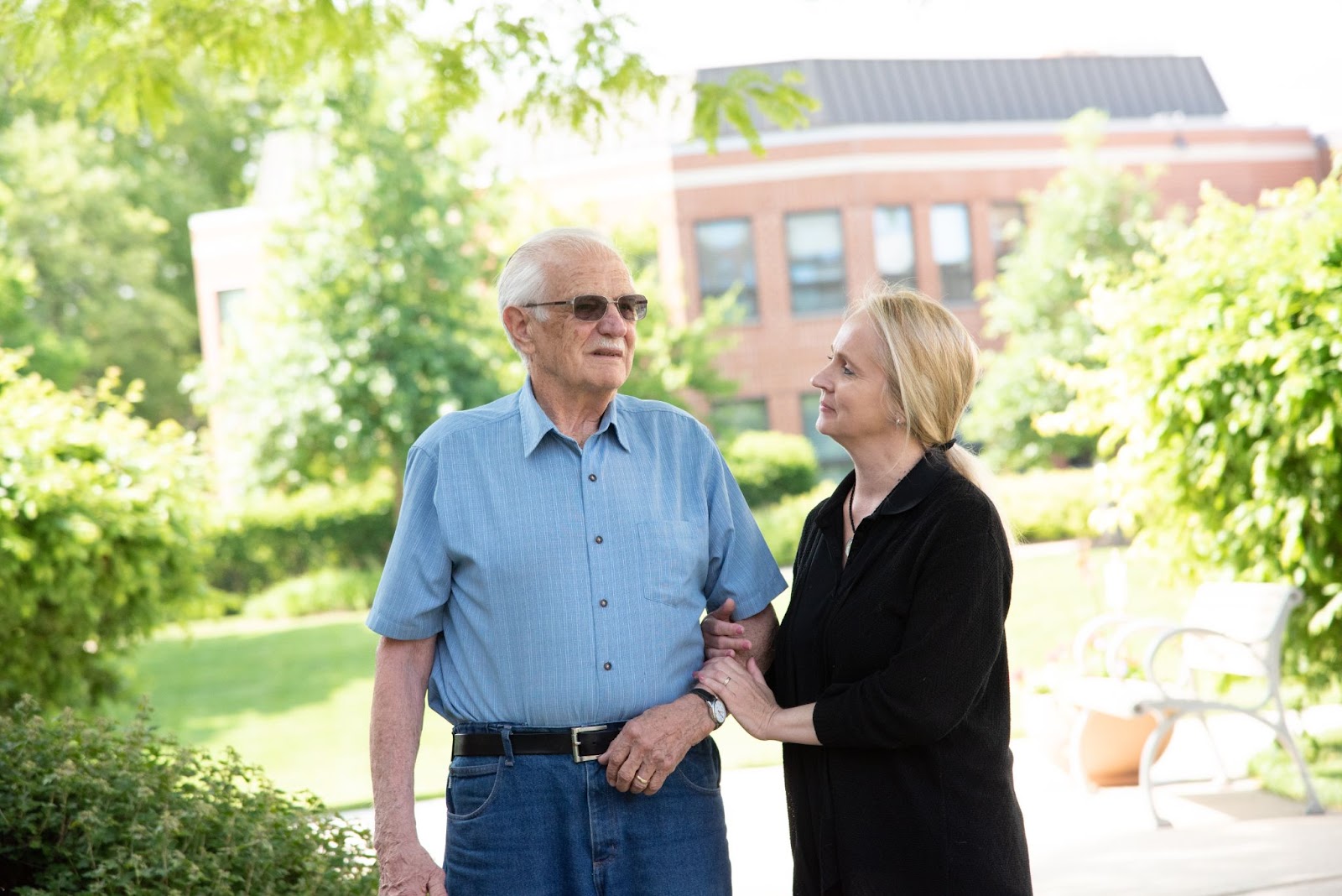 woman visiting her father in assisted living